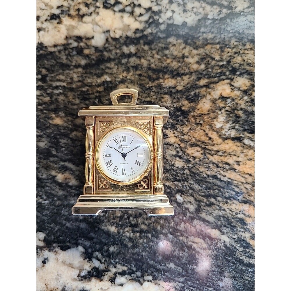 Mini Sunbeam Mantle Clock needs batteries